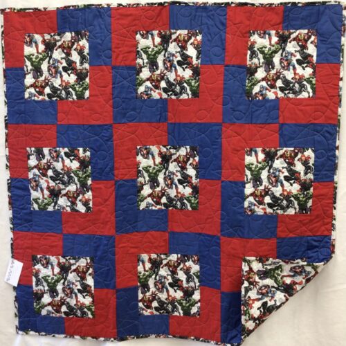 Avengers baby quilt featuring the iconic Marvel characters coordinated with bold red and blue tones on the front. The backing is a matching Avengers print.